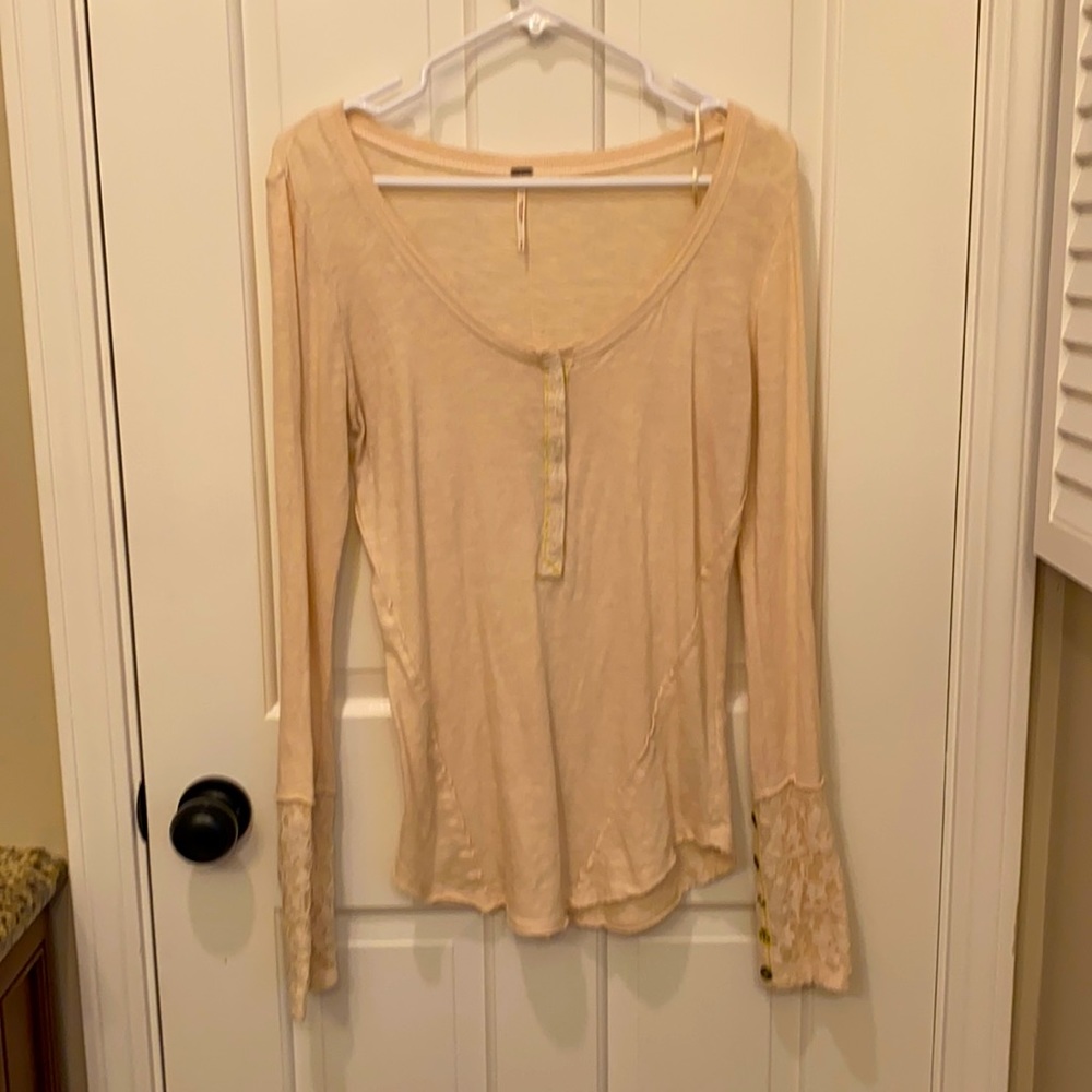 Free people cream shirt with lace sleeves and different buttons